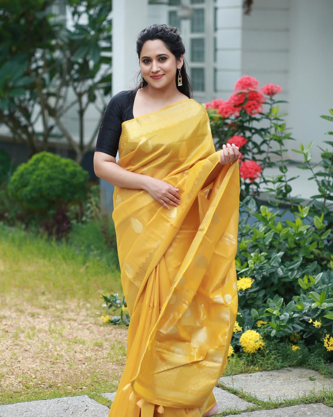 Malayalam Actress Miya George Stills in Yellow Saree Black Blouse